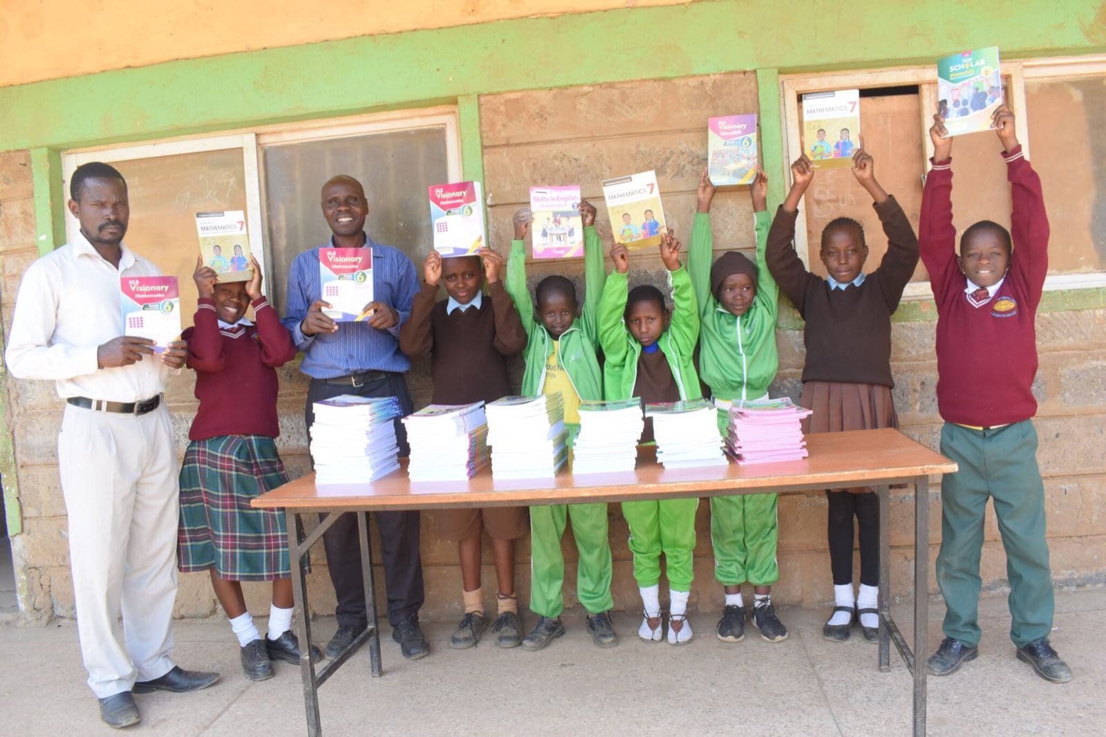 Pupils receiving donated textbooks